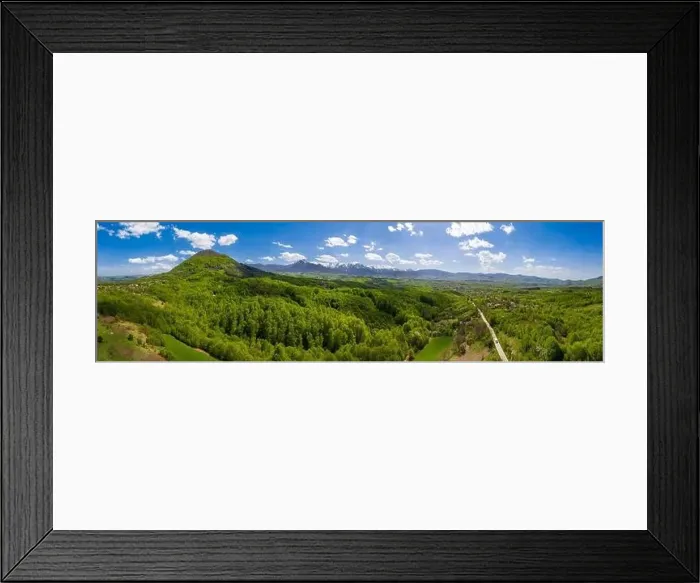Framed Print : panoramic view from drone of the mountain with green hills and road in spring Framed Print : panoramic view from drone of the mountain with green hills and road in spring