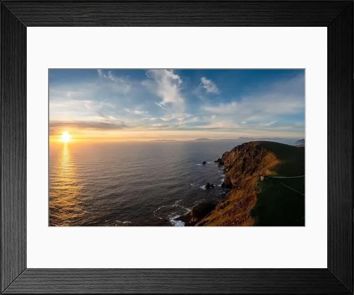 Framed Print : sunset over the Atlantic Ocean and the cliffs of Bray Head on Valentia Island in County Kerry of western Ireland Framed Print : sunset over the Atlantic Ocean and the cliffs of Bray Head on Valentia Island in County Kerry of western Ireland