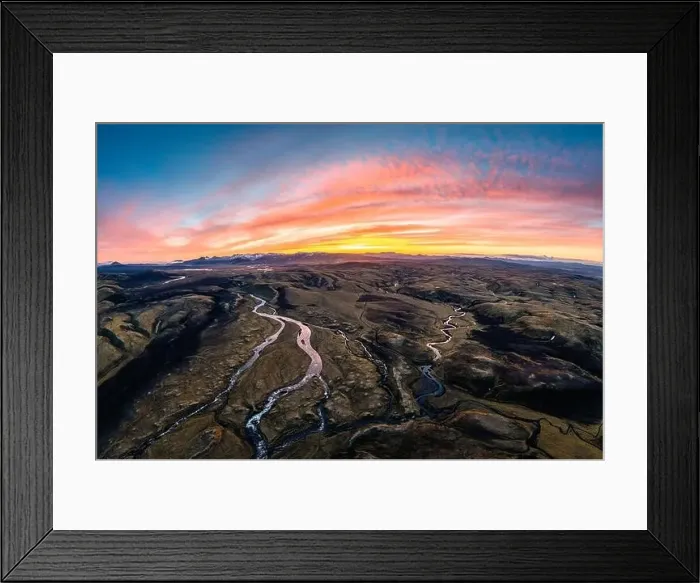 Framed Print : Aerial view of Spectacular moss on lava field with river flowing in Icelandic highlands on wilderness in the sunset Framed Print : Aerial view of Spectacular moss on lava field with river flowing in Icelandic highlands on wilderness in the sunset