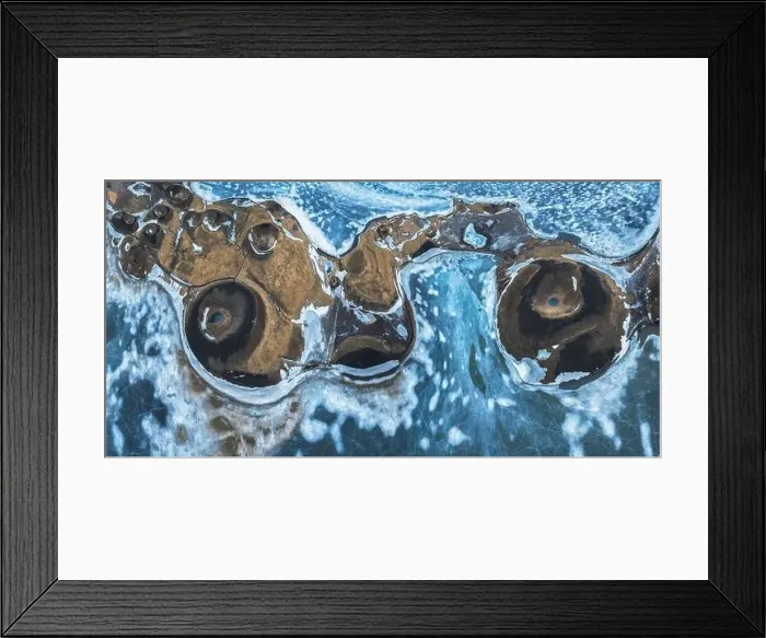 Framed Print : Top view picturesque drone view of Skutustadagigar pseudocraters covered with snow located on shore of Lake Myvatn in Framed Print : Top view picturesque drone view of Skutustadagigar pseudocraters covered with snow located on shore of Lake Myvatn in