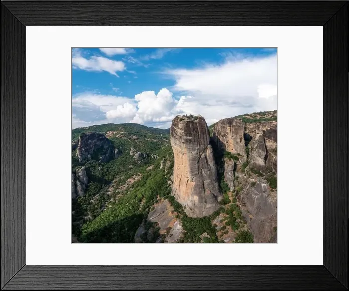 Framed Print : Meteora Greece. Blue sky with clouds over Monastery buildings on top of rocks. Europe travel destination Framed Print : Meteora Greece. Blue sky with clouds over Monastery buildings on top of rocks. Europe travel destination