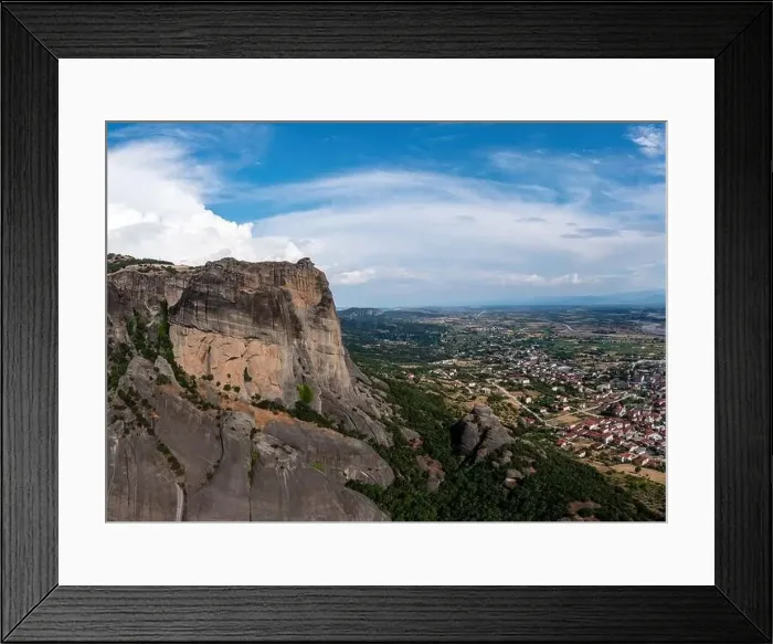 Framed Print : Meteora Greece at sunrise, Blue sky with clouds over Monastery buildings on top of rocks and Kalambaka town and valley Framed Print : Meteora Greece at sunrise, Blue sky with clouds over Monastery buildings on top of rocks and Kalambaka town and valley