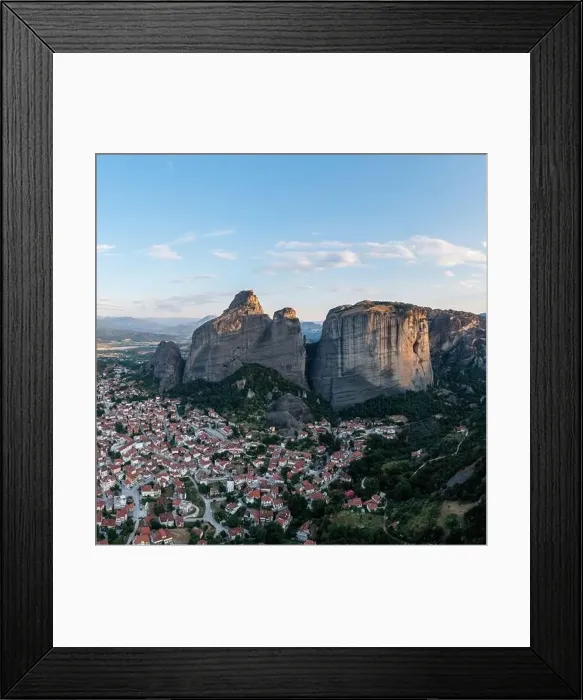 Framed Print : Meteora Greece at sunrise, Blue sky with clouds over Monastery buildings on top of rocks and Kalambaka town and valley Framed Print : Meteora Greece at sunrise, Blue sky with clouds over Monastery buildings on top of rocks and Kalambaka town and valley