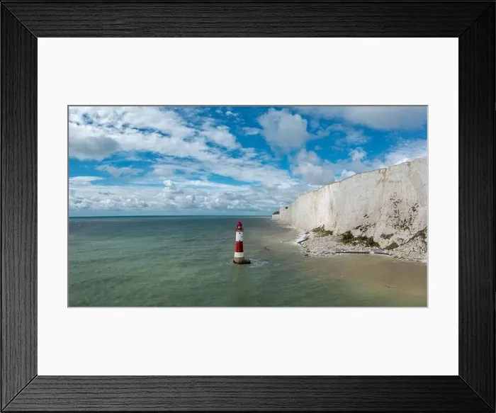 Framed Print : view of the Beachy Head Lighthouse in the English Channel with the white cliffs of the Seven Sisters in the background Framed Print : view of the Beachy Head Lighthouse in the English Channel with the white cliffs of the Seven Sisters in the background