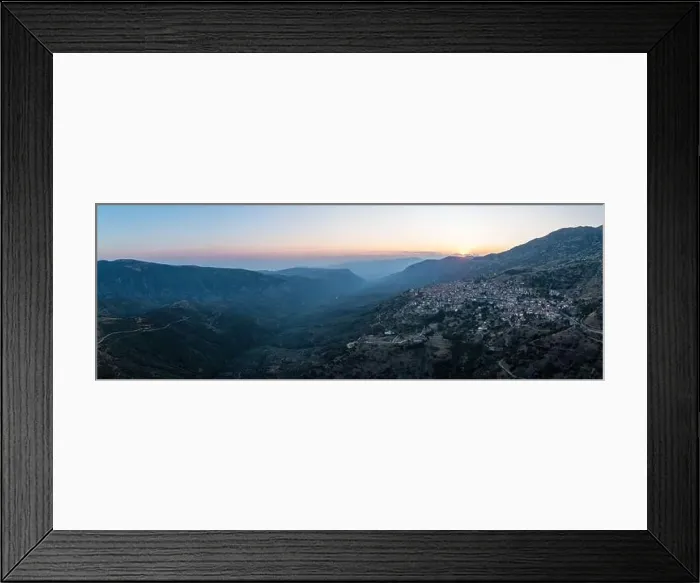 Framed Print : Arachova Greece mountain town aerial panoramic view. Traditional houses and stone tower clock at sunset Framed Print : Arachova Greece mountain town aerial panoramic view. Traditional houses and stone tower clock at sunset
