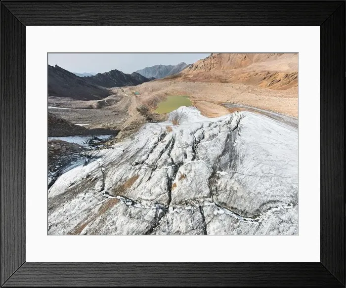 Framed Print : Beautiful scenery of the ice glacier with crack and mountain lakes near Almaty city Framed Print : Beautiful scenery of the ice glacier with crack and mountain lakes near Almaty city