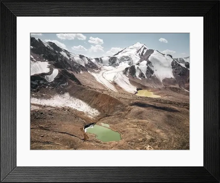 Framed Print : Beautiful scenery of the glacier mountain lakes with snow cap summit near Almaty city Framed Print : Beautiful scenery of the glacier mountain lakes with snow cap summit near Almaty city