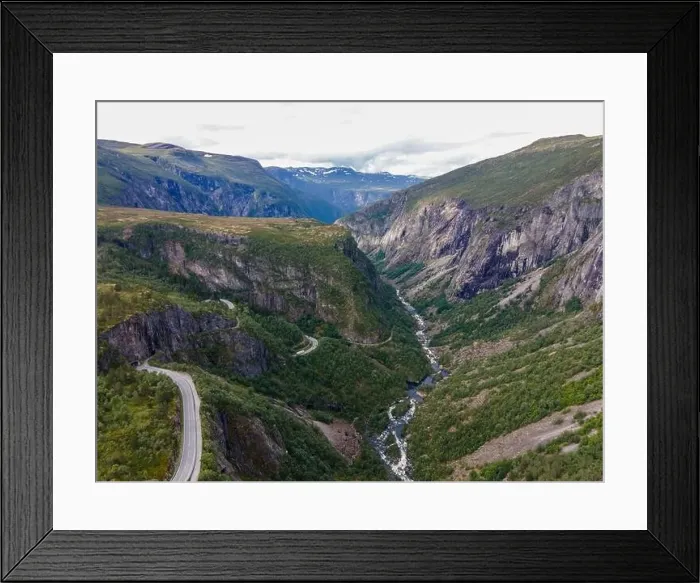 Framed Print : Norway - Trollstigen has 11 crazy hairpin bends down the mountain, passing huge waterfalls. Drone shot Framed Print : Norway - Trollstigen has 11 crazy hairpin bends down the mountain, passing huge waterfalls. Drone shot