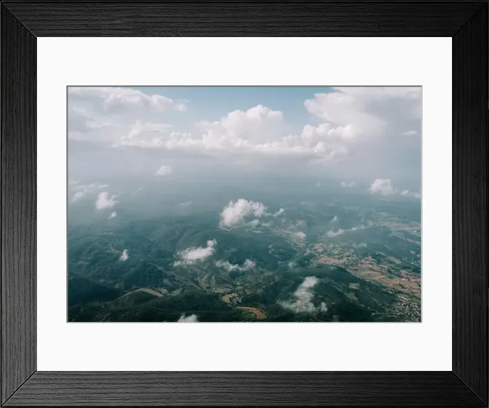 Framed Print : A panoramic top view of daylight and over all clouds under the blue sky Framed Print : A panoramic top view of daylight and over all clouds under the blue sky
