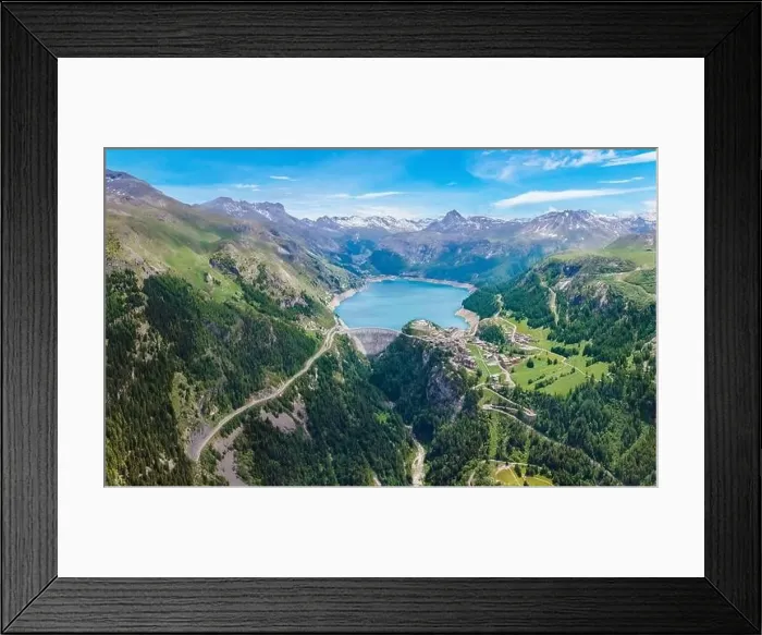 Framed Print : Water dam and blue reservoir lake aerial overview in Alps mountains in summer generating hydroelectricity Framed Print : Water dam and blue reservoir lake aerial overview in Alps mountains in summer generating hydroelectricity