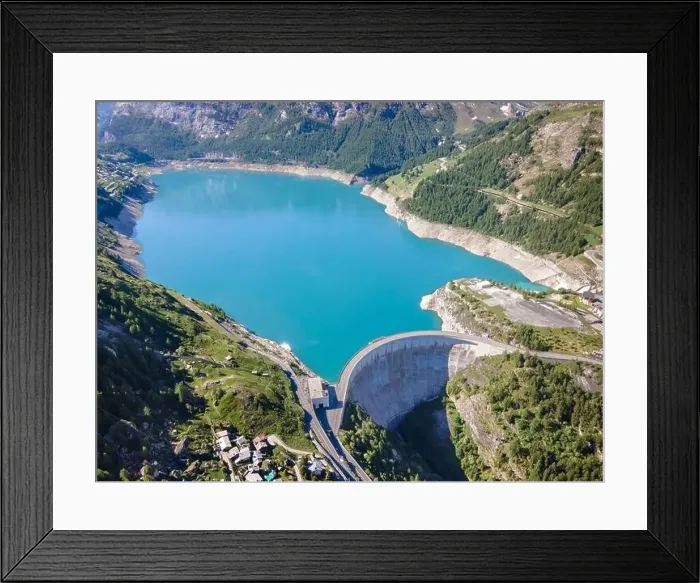 Framed Print : Water dam and blue reservoir lake aerial view in Alps mountains generating hydroelectricity Framed Print : Water dam and blue reservoir lake aerial view in Alps mountains generating hydroelectricity