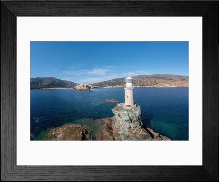 Framed Print : Andros Island. Greece. The stone beacon on a rock aerial drone view