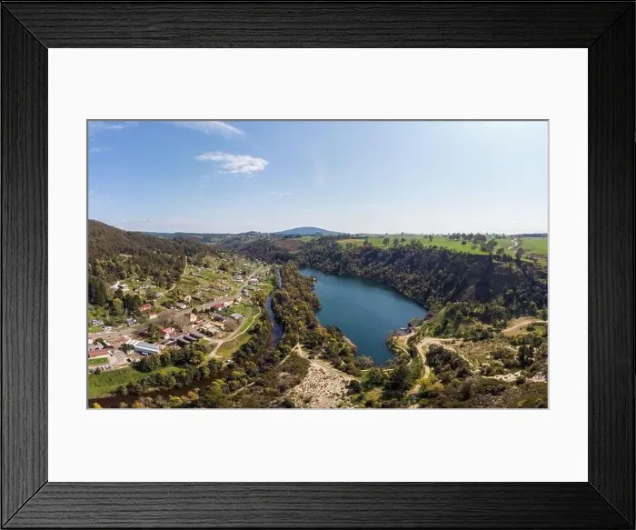 Framed Print : An aerial view from a drone on a warm spring day over Derby in Tasmania, Australia Framed Print : An aerial view from a drone on a warm spring day over Derby in Tasmania, Australia
