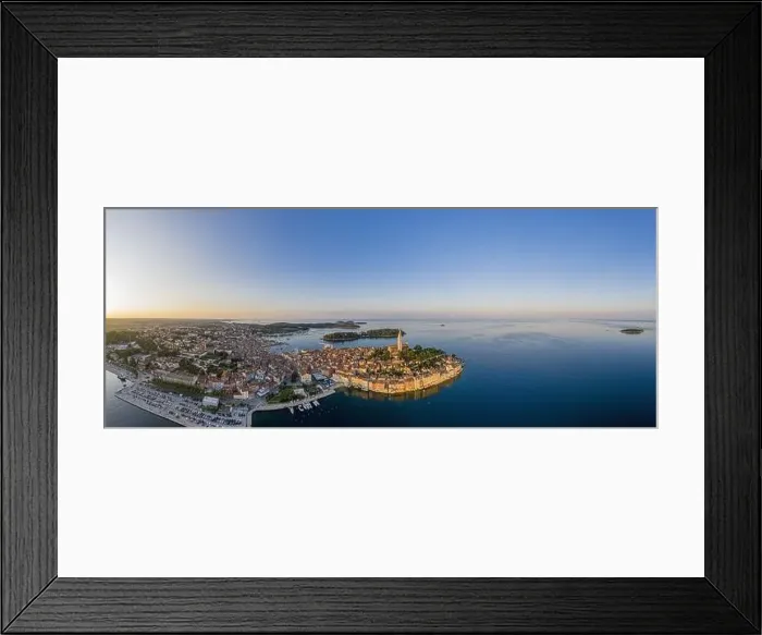 Framed Print : Panoramic aerial drone picture of the historic city Rovinj in Croatia during sunrise in summer Framed Print : Panoramic aerial drone picture of the historic city Rovinj in Croatia during sunrise in summer