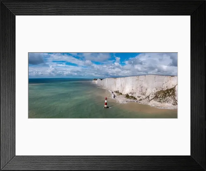 Framed Print : A panorama view of the Beachy Head Lighthouse in the English Channel and the white cliffs of the Jurassic Coast Framed Print : A panorama view of the Beachy Head Lighthouse in the English Channel and the white cliffs of the Jurassic Coast