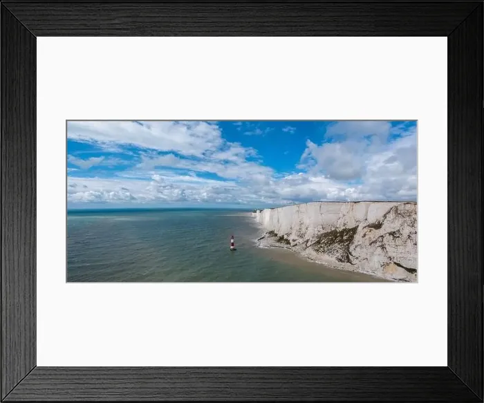 Framed Print : A panorama view of the Beachy Head Lighthouse in the English Channel and the white cliffs of the Jurassic Coast Framed Print : A panorama view of the Beachy Head Lighthouse in the English Channel and the white cliffs of the Jurassic Coast