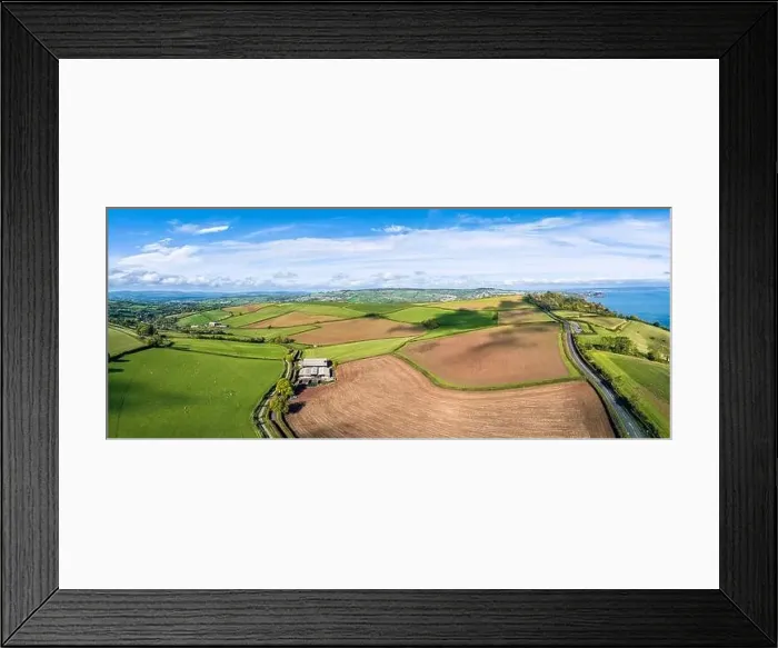Framed Print : Fields and Farmlands over Labrador Bay, Devon, England Framed Print : Fields and Farmlands over Labrador Bay, Devon, England