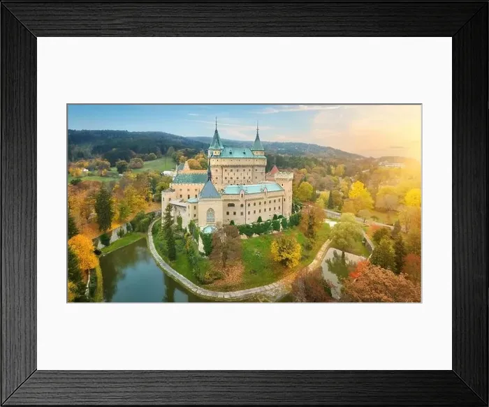 Framed Print : Bojnice castle. Panoramic aerial view of a neo-gothic romantic fairy-tale castle in a colourful autumn garden Framed Print : Bojnice castle. Panoramic aerial view of a neo-gothic romantic fairy-tale castle in a colourful autumn garden