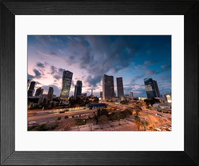 Framed Print : TEL AVIV, ISRAEL - MARCH 1, 2019: Night Aerial view of tel aviv skyline with urban skyscrapers and blue sky, Israel Framed Print : TEL AVIV, ISRAEL - MARCH 1, 2019: Night Aerial view of tel aviv skyline with urban skyscrapers and blue sky, Israel