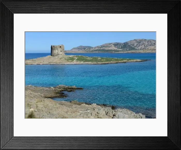 Framed Print : View at the beach of Pelosa at Stintino on Sardinia in Italy Framed Print : View at the beach of Pelosa at Stintino on Sardinia in Italy