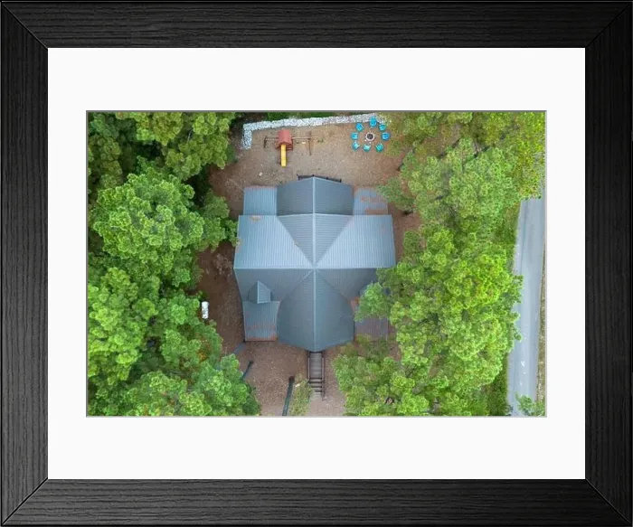 Framed Print : Aerial view of secluded cottage in the woods among green trees. Cabin in the forest in Broken Bow, Oklahoma USA Framed Print : Aerial view of secluded cottage in the woods among green trees. Cabin in the forest in Broken Bow, Oklahoma USA