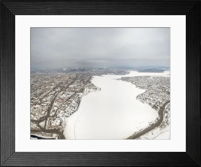 Framed Print : Winter view of the embankment of the city Nizhny Tagil and metallurgical plant from above Framed Print : Winter view of the embankment of the city Nizhny Tagil and metallurgical plant from above