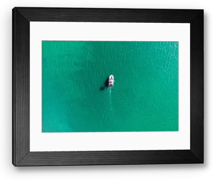 Framed Print : Aerial drone photo of rib speed boat cruising in tropical exotic bay with emerald sea Framed Print : Aerial drone photo of rib speed boat cruising in tropical exotic bay with emerald sea