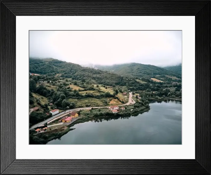 Framed Print : landscape of the reservoir from a drone near the road and the forest vegetation on a cloudy day Framed Print : landscape of the reservoir from a drone near the road and the forest vegetation on a cloudy day