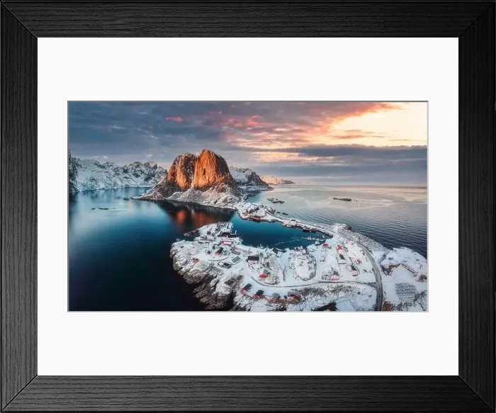 Framed Print : Beautiful landscape of aerial view of snowy mountain and fishing village on coastline in winter at Lofoten Islands Framed Print : Beautiful landscape of aerial view of snowy mountain and fishing village on coastline in winter at Lofoten Islands