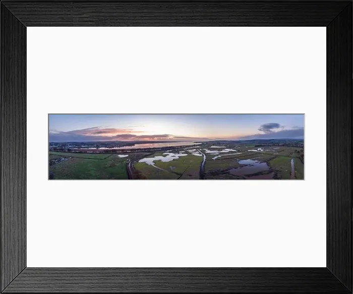Framed Print : Sunrise over Wetlands and meadows in RSPB Exminster and Powderham Marshe from a drone, Exeter, Devon, England Framed Print : Sunrise over Wetlands and meadows in RSPB Exminster and Powderham Marshe from a drone, Exeter, Devon, England