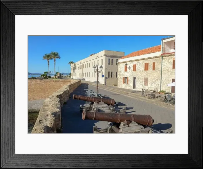 Framed Print : View at the pedestrian zone of Alghero on Sardinia in Italy Framed Print : View at the pedestrian zone of Alghero on Sardinia in Italy