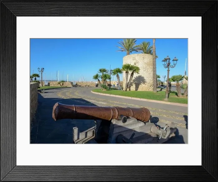 Framed Print : View at the pedestrian zone of Alghero on Sardinia in Italy Framed Print : View at the pedestrian zone of Alghero on Sardinia in Italy