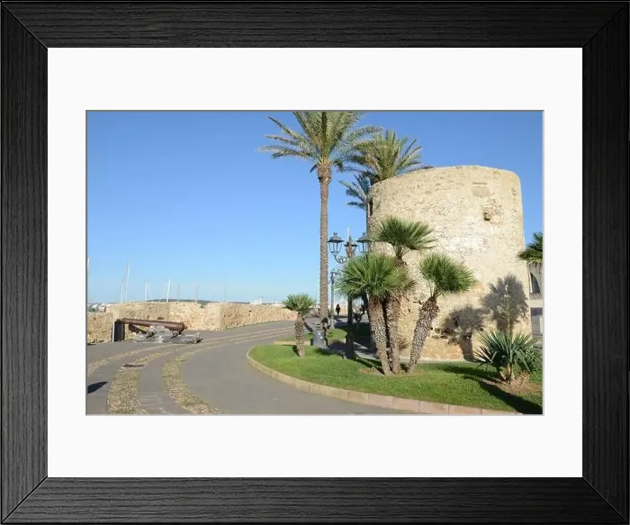 Framed Print : View at the pedestrian zone of Alghero on Sardinia in Italy Framed Print : View at the pedestrian zone of Alghero on Sardinia in Italy