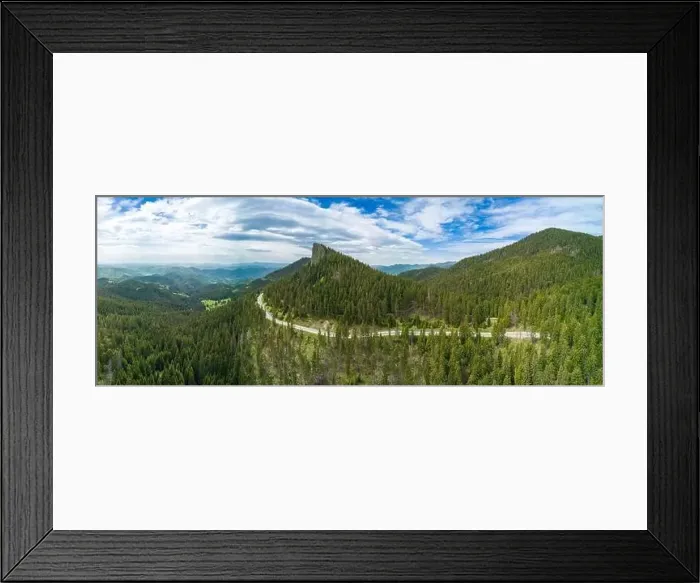 Framed Print : Winding track is like slopes of Rhodope Mountains with forests. Panorama, top view Framed Print : Winding track is like slopes of Rhodope Mountains with forests. Panorama, top view