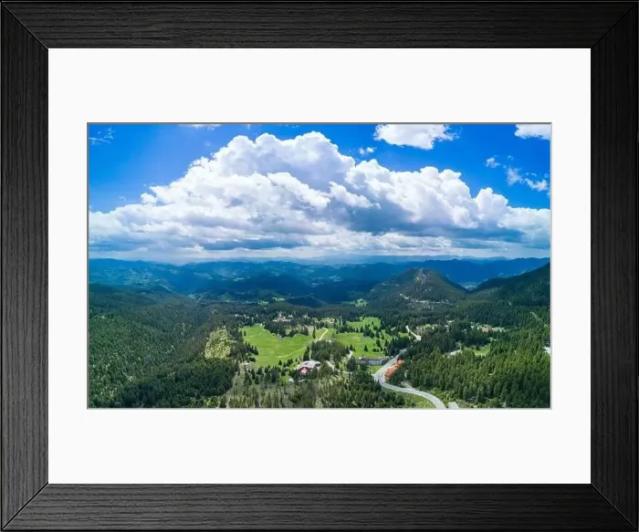 Framed Print : Valley of Balkan mountains with fog, sunny clouds and forests. Village Pamporovo. Panorama, top view Framed Print : Valley of Balkan mountains with fog, sunny clouds and forests. Village Pamporovo. Panorama, top view