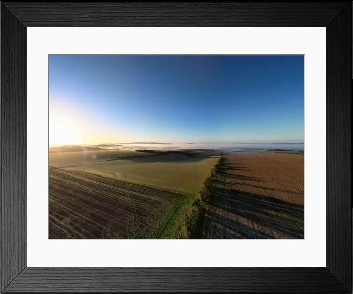 Framed Print : An aerial view on a misty autumn morning over Cranborne Chase AONB in Wiltshire, UK Framed Print : An aerial view on a misty autumn morning over Cranborne Chase AONB in Wiltshire, UK