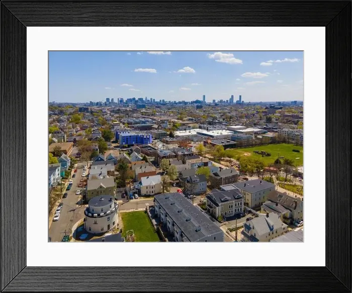 Framed Print : Somerville city center aerial view on Somerville Avenue with Boston skyline at the background in spring Framed Print : Somerville city center aerial view on Somerville Avenue with Boston skyline at the background in spring
