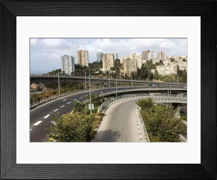 Framed Print : HAIFA, ISRAEL - September 29, 2022: Highway interchange with traffic on multiple levels, Aerial image Framed Print : HAIFA, ISRAEL - September 29, 2022: Highway interchange with traffic on multiple levels, Aerial image