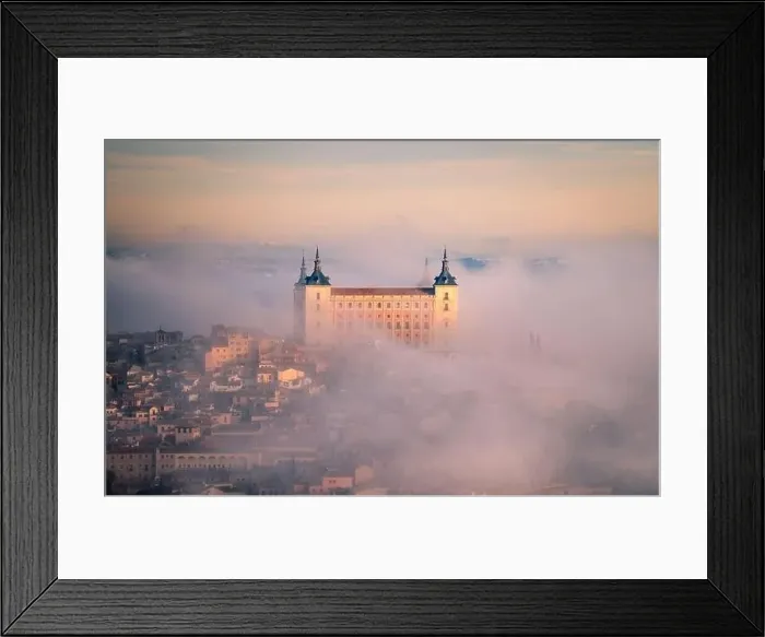 Framed Print : From above wonderful landscape of medieval castle built over city in misty colorful sunrise surrounded by clouds Framed Print : From above wonderful landscape of medieval castle built over city in misty colorful sunrise surrounded by clouds