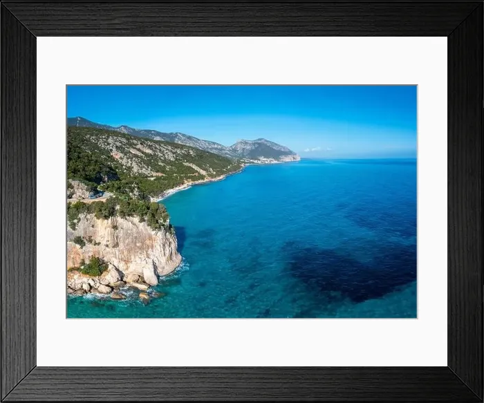 Framed Print : Aerial view of the rugged mountainous coast near Cala Gonone with turqouise water and small white sand beaches Framed Print : Aerial view of the rugged mountainous coast near Cala Gonone with turqouise water and small white sand beaches
