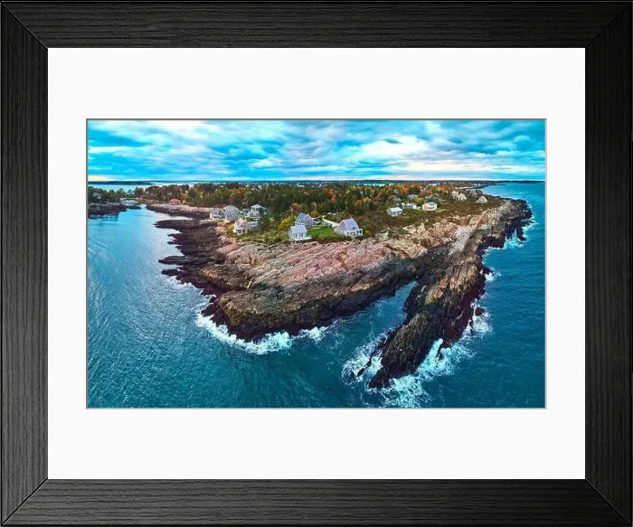 Framed Print : Stunning aerial over rocky coasts of Maine on the ocean with houses, fall foliage, and dusk light Framed Print : Stunning aerial over rocky coasts of Maine on the ocean with houses, fall foliage, and dusk light