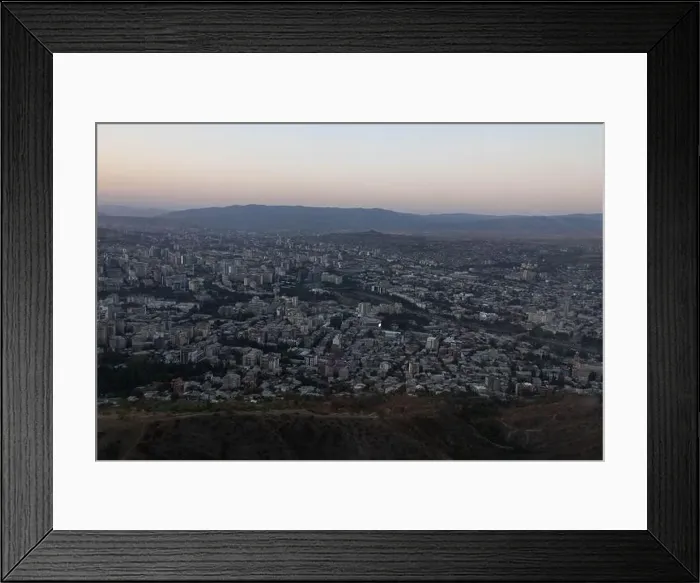 Framed Print : View of Tbilisi City from the mountain, Mtatsminda park, on the sunset Framed Print : View of Tbilisi City from the mountain, Mtatsminda park, on the sunset