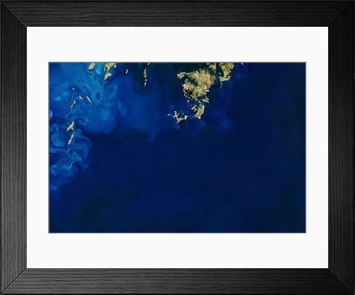 Framed Print : Amazing ocean with blue color waves view from above. Blue tones and nature sea with island top view Framed Print : Amazing ocean with blue color waves view from above. Blue tones and nature sea with island top view