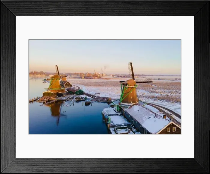 Framed Print : Drone view at the Zaanse Schans windmill village during winter with snow landscape in the Netherlands Holland village Framed Print : Drone view at the Zaanse Schans windmill village during winter with snow landscape in the Netherlands Holland village