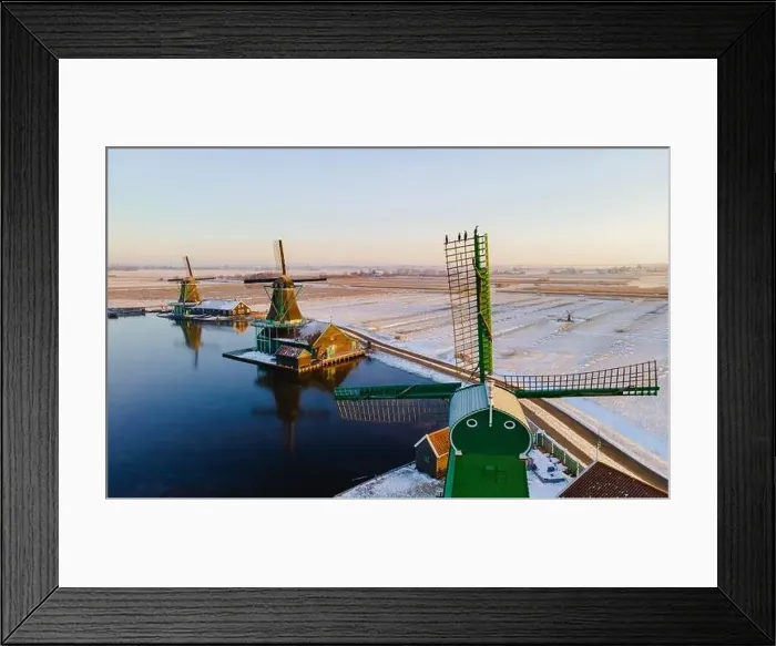 Framed Print : Windmill village Zaanse Schans during winter with snow landscape in the Netherlands Holland village in winter Framed Print : Windmill village Zaanse Schans during winter with snow landscape in the Netherlands Holland village in winter