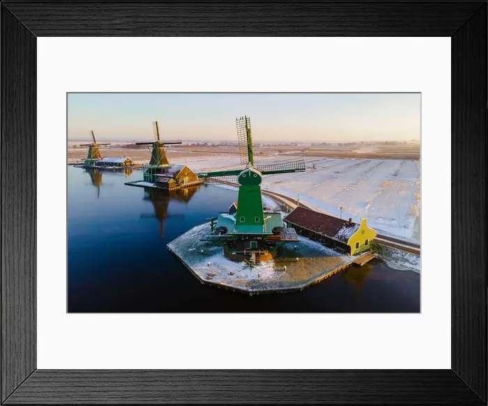 Framed Print : Windmill village Zaanse Schans during winter with snow landscape in the Netherlands Holland village in winter Framed Print : Windmill village Zaanse Schans during winter with snow landscape in the Netherlands Holland village in winter