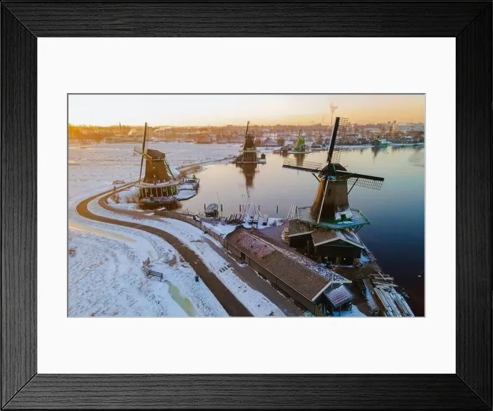 Framed Print : Windmill village Zaanse Schans during winter with snow landscape in the Netherlands Holland village in winter Framed Print : Windmill village Zaanse Schans during winter with snow landscape in the Netherlands Holland village in winter