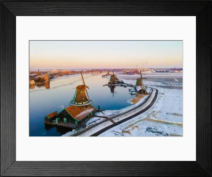 Framed Print : Snow at the Zaanse Schans windmill village during winter with snow landscape in the Netherlands Holland village in Framed Print : Snow at the Zaanse Schans windmill village during winter with snow landscape in the Netherlands Holland village in