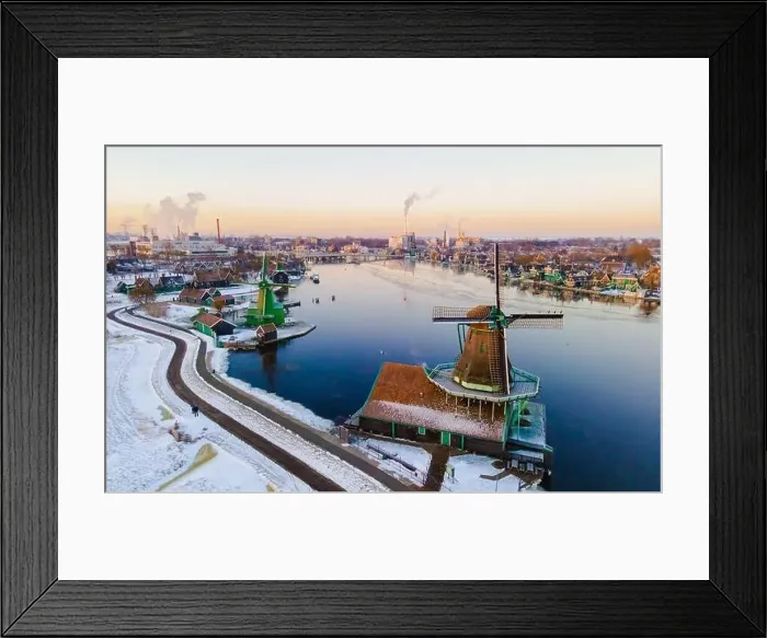 Framed Print : Snow at the Zaanse Schans windmill village during winter with snow landscape in the Netherlands Holland village in Framed Print : Snow at the Zaanse Schans windmill village during winter with snow landscape in the Netherlands Holland village in