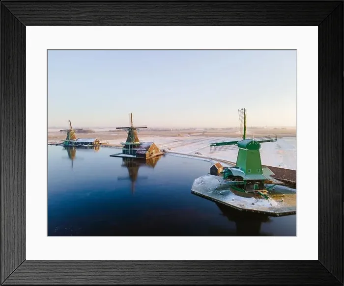 Framed Print : Zaanse Schans windmill village during winter with snow in the Netherlands Holland village in winter Framed Print : Zaanse Schans windmill village during winter with snow in the Netherlands Holland village in winter